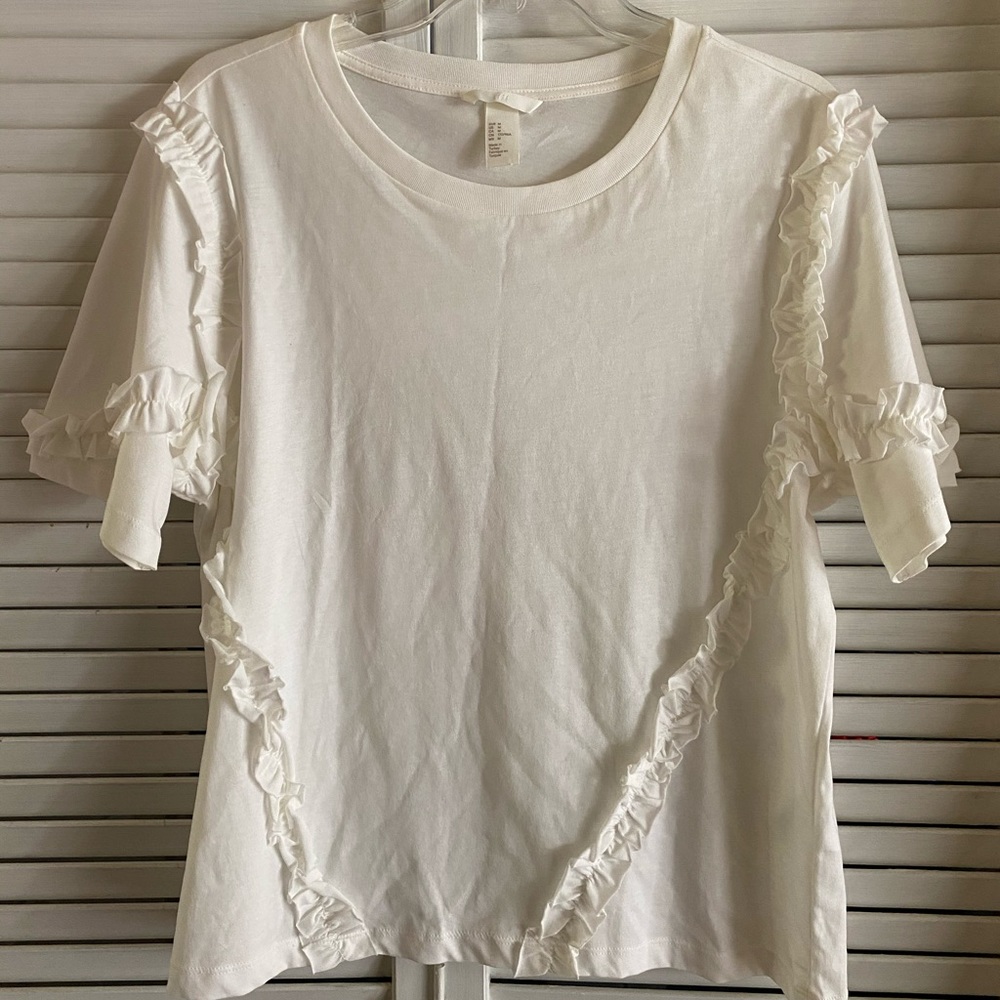 Cream short sleeved ruffle top